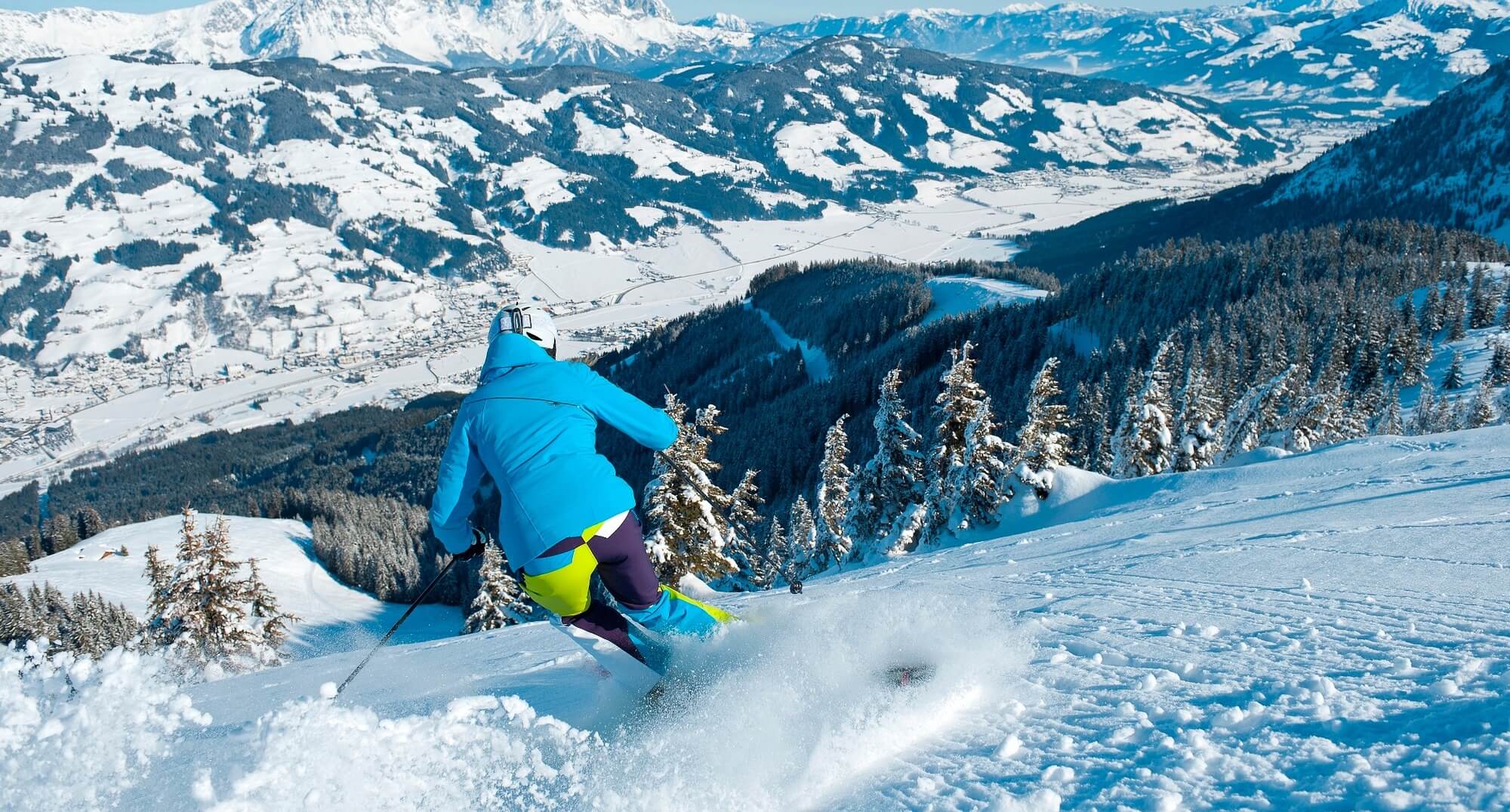 Homepage image of man skiing downhill